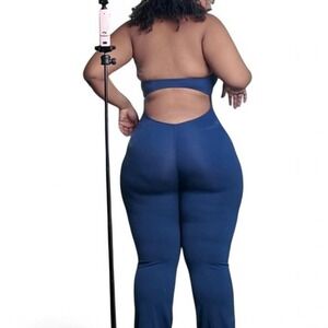 Pink jumpsuit with wide leg pants and halter neck size Large